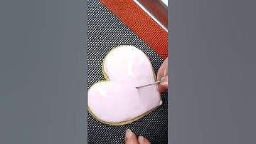Heart sugar cookie with wet on wet technique.