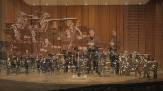 Passionately Curious for 6 trumpets and wind ensemble (live)