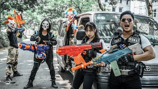 LTT Films : Couple S.W.A.T Silver Flash Nerf Guns Fight Masked Clown Gang In Fraudulent Transactions