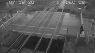 Man Dodges Train at level crossing - Shocking!! High Quality FULL