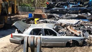 Crushing cars at the junkyard again