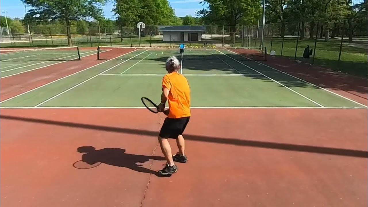 Tennis record, hitting balls with Slinger tennis balls machine at City