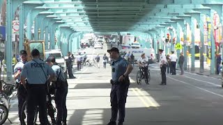 Crews clear out Philly's Kensington Avenue