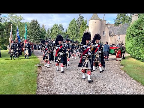 Lonach Highlanders march out of Candacraig House in Strathdon Scotland during 2022 Lonach Gathering