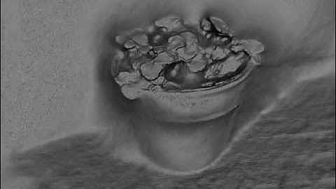 Real-time dense geometry from a handheld camera