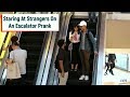 Staring At Strangers On An Escalator Prank !