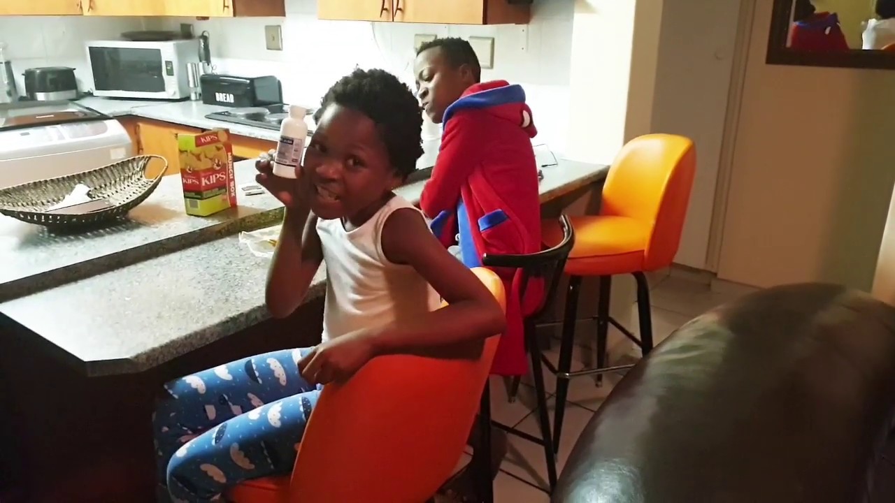 Getting Kgosi ready for school (laxative time)