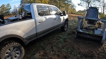 Mulching a fence line and opening up a old field