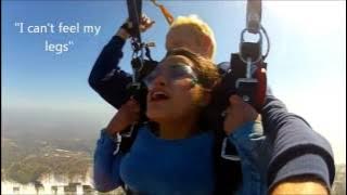 Young woman ENJOYS skydiving.