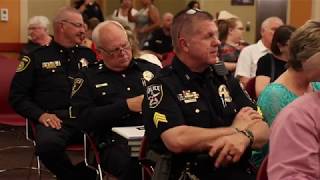 The north richland hills library hosted behind texas badge book
release event with more than a two dozen officers in attendance.
authors doug and car...