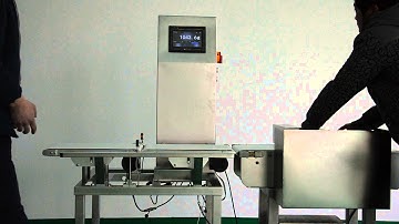 Techik IXL-230 checkweigher with push rejector and waste bin