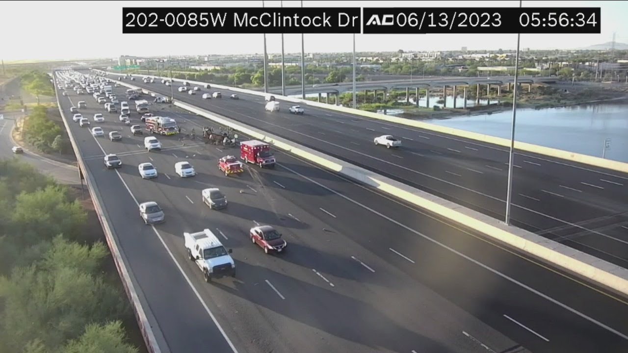 Rollover crash causes traffic backup on Loop 202 - YouTube