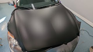 Before & after video wrapping hood of Mazda 3 in Hexis Deep Black Satin vinyl wrap