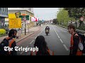 Moment motorcyclist rams past just stop oil protesters blocking the road