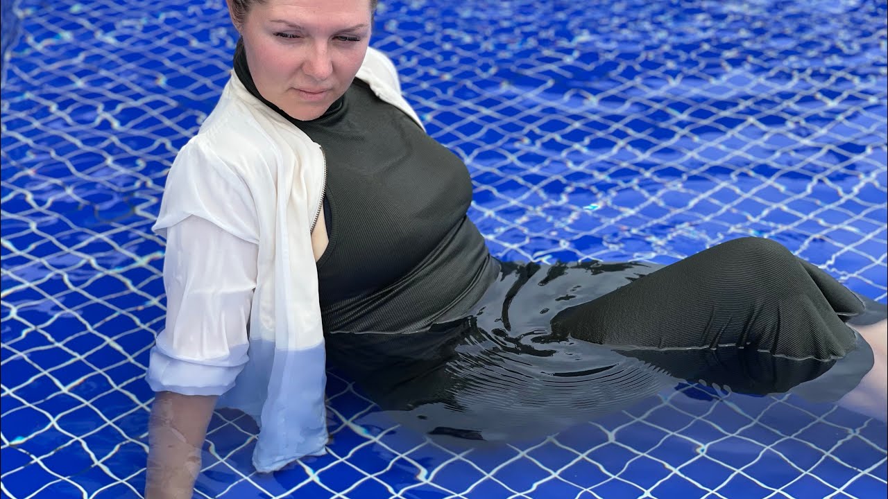 Green long dress, white jacket, nylon socks. Wetlook pool video. YouTube — free download