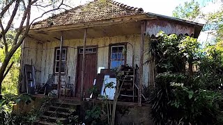 Beautiful glass windows, but full of abandoned furniture and appliances.