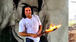 Portrait drawing with charcoal and fire on the wall🔥Attractive and special drawing with fire