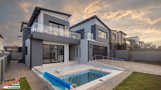 Double-Storey Family Home with Entertainment Room, Pool Views, and PJ Lounge Balcony