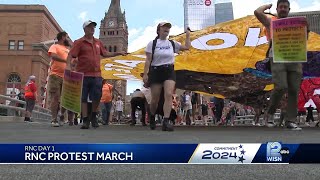 Protesters march into RNC soft security zone to have voices heard screenshot 4