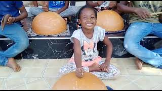 Children's drum and dance ensemble practicing the calabash in Accra, Ghana Update