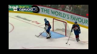 Ethan Bear wins it for the canucks !