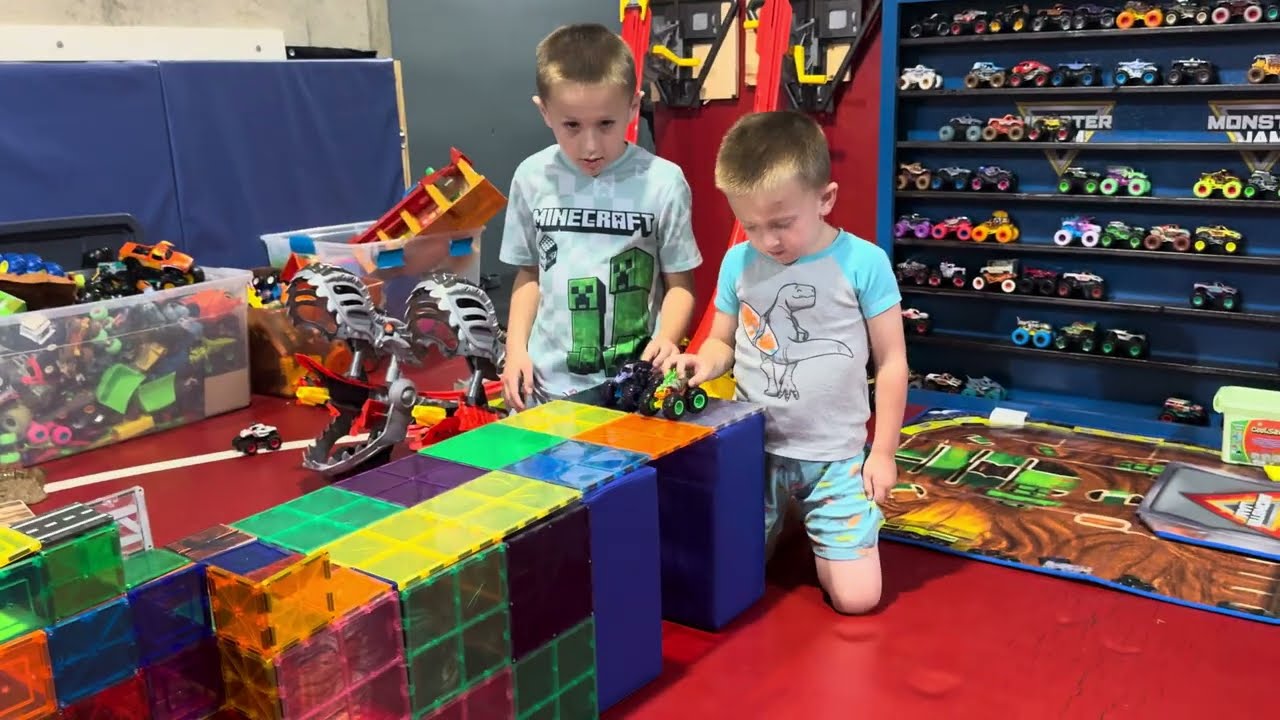 Racing Monster trucks on magna tile race track day 2