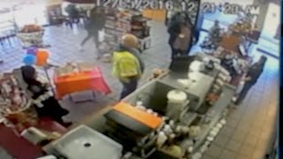 Surveillance video: Cashier assaulted at Dunkin' Donuts