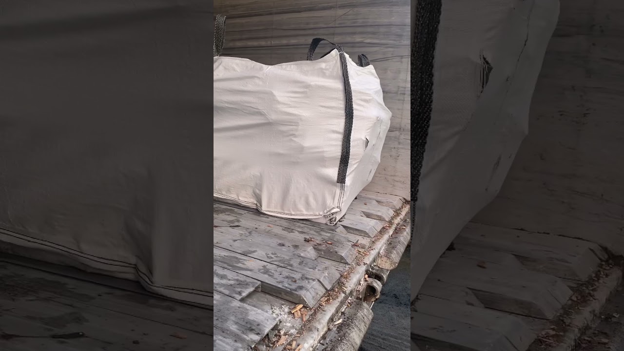 Walking floor trailer delivering stone