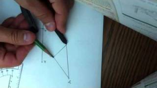 Drawing a congruent triangle using the side-side-side postulate.