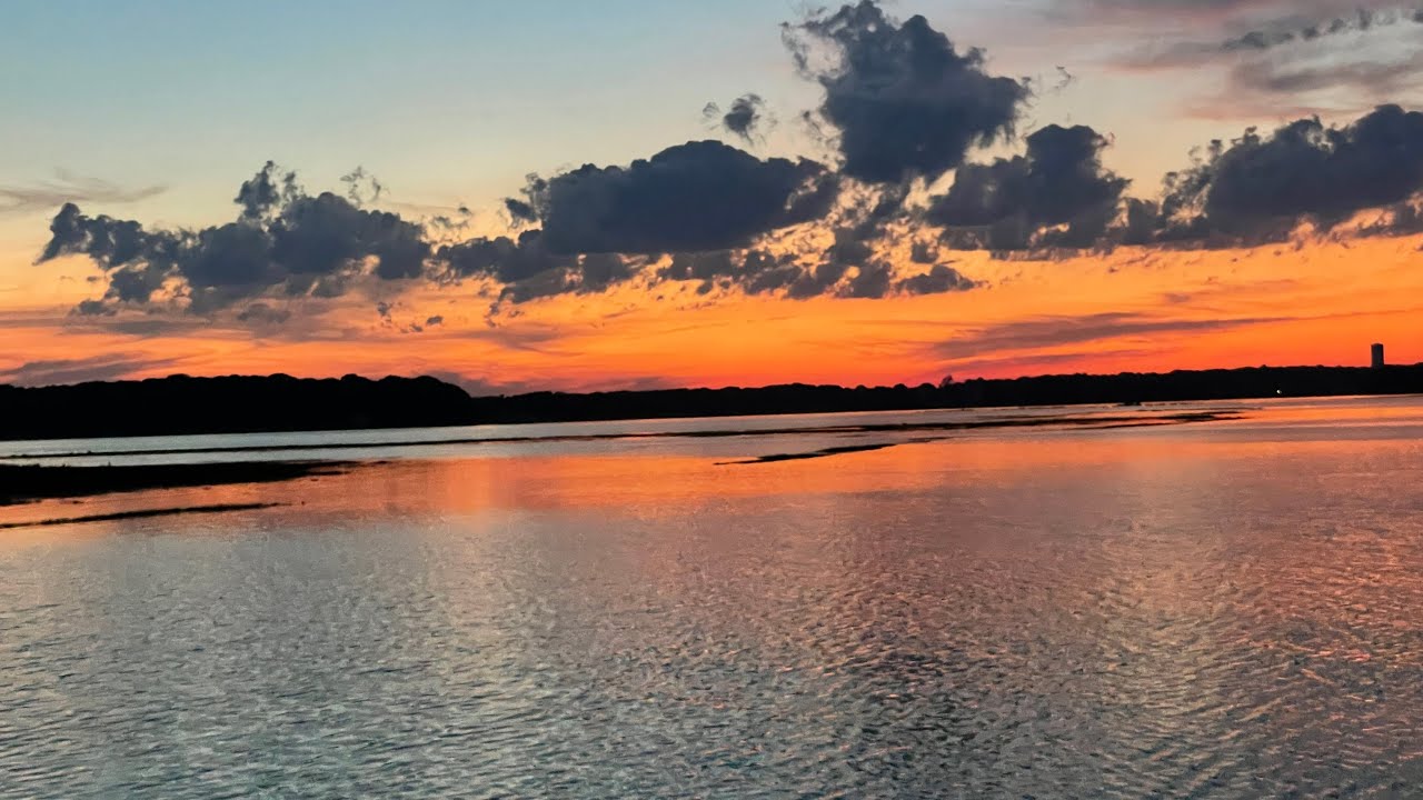 Strawberry full moon sky over Valkyrie, West Island