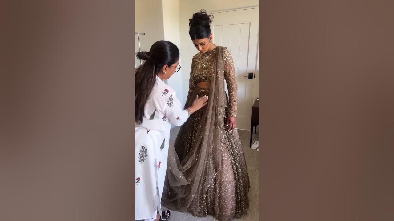 Beautiful waterfall drape for the bride Dolly Jain dupatta draping