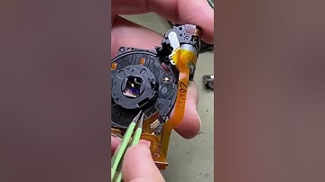 Canon Camera Repair clean out from sand Lens error fix by Works Perfect