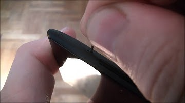 How To Remove The Sim Card Tray And Install A SIM Card On An HTC 8X Smartphone