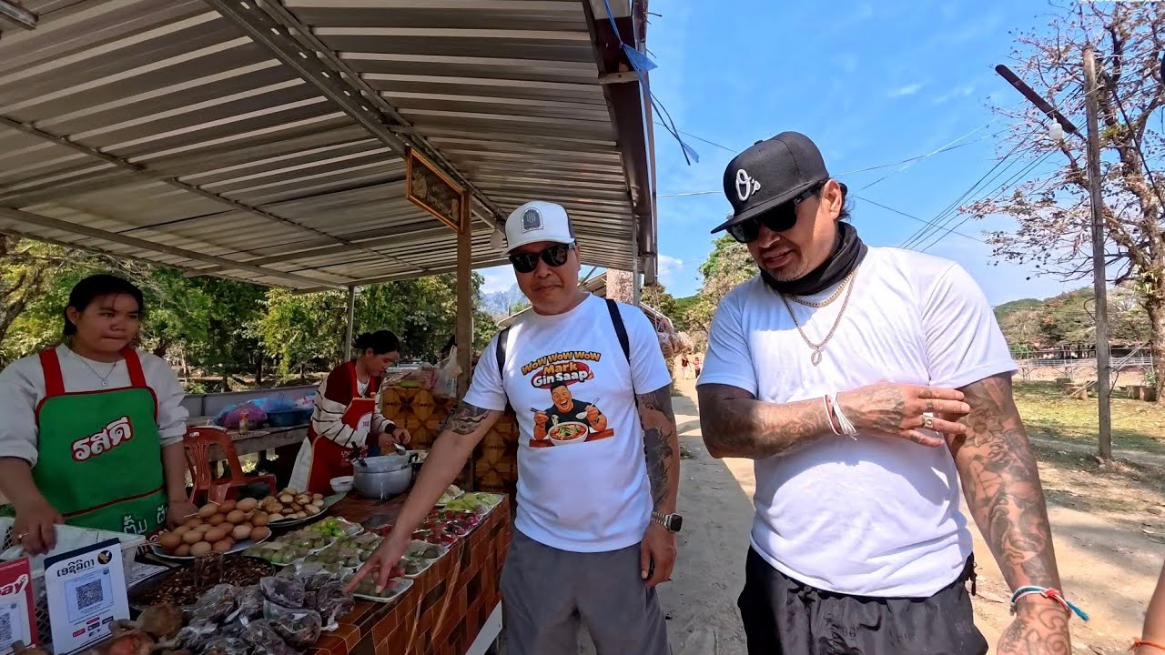 Visiting a popular cave in Vang Vieng with Lao Deportees 