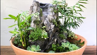 making a foggy Waterfall Terrarium in a Super Large Pottery.
