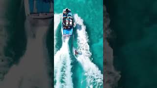 A true party wave! 🐬🏄‍♂️ #waketowaketc #turksandcaicos #explore #paradise #travel #wakesurfing