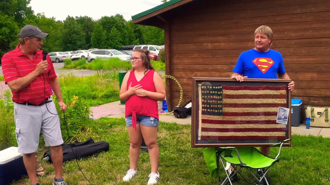 Rachel Mueller singing the national anthem at the Griesenauer Family Reunion
