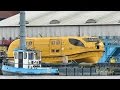 Meyer Werft shipyard tug WILM ROLF tending ANTHEM of the SEAS lifeboats