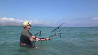 first hour kitesurfing lessons in Mallorca in May kite control italian guy