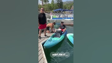 Epic Fail: Man Tries to Get in Canoe and Falls into Water