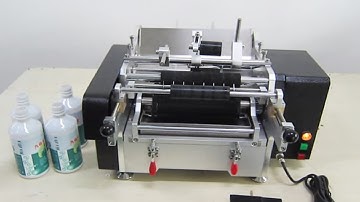 demo video of teaching you how to operate semi automatic glass bottles cold paste labeling machine