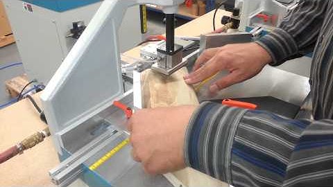 Joining large compound miters for casket lids on two Hoffmann MU2-P dovetail routing machines
