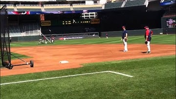 Twins catcher Joe Mauer takes pregame grounders at first base