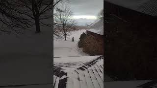 Out a rear window, snow+fog+wind