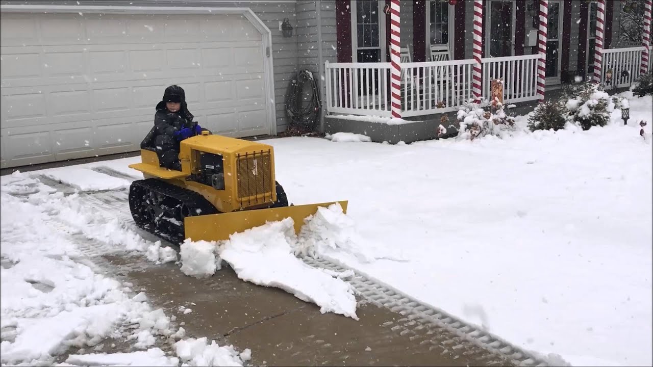 My Son Plowing Snow On His Caterpillar Replica Mini Dozer - YouTube