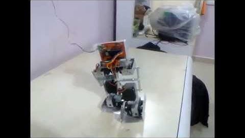 6-servo based biped robot using PIC16f877a by shreyas shahane .wmv