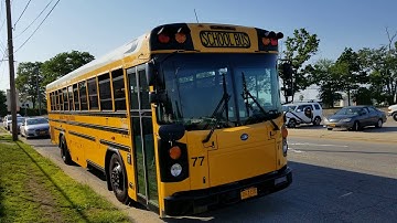GARDEN CITY PUBLIC SCHOOLS YELLOW SCHOOL BUS IN OYSTER BAY, NEW YORK
