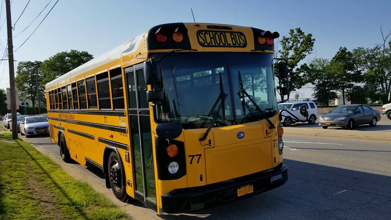 GARDEN CITY PUBLIC SCHOOLS YELLOW SCHOOL BUS IN OYSTER BAY, NEW YORK