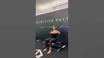 Seated trunk rotation with medball hug