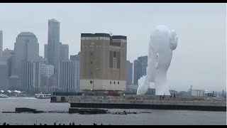 Giant sculpture of 'shushing' woman turning heads in Jersey City